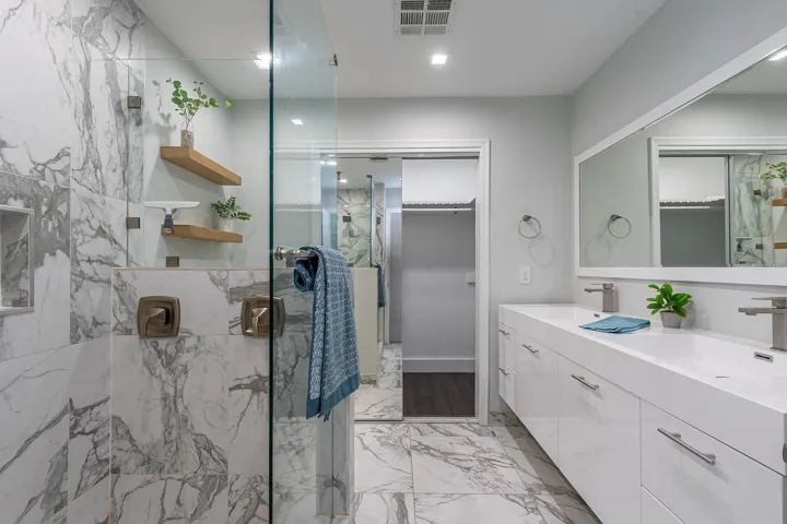 Primary bath with frameless glass shower