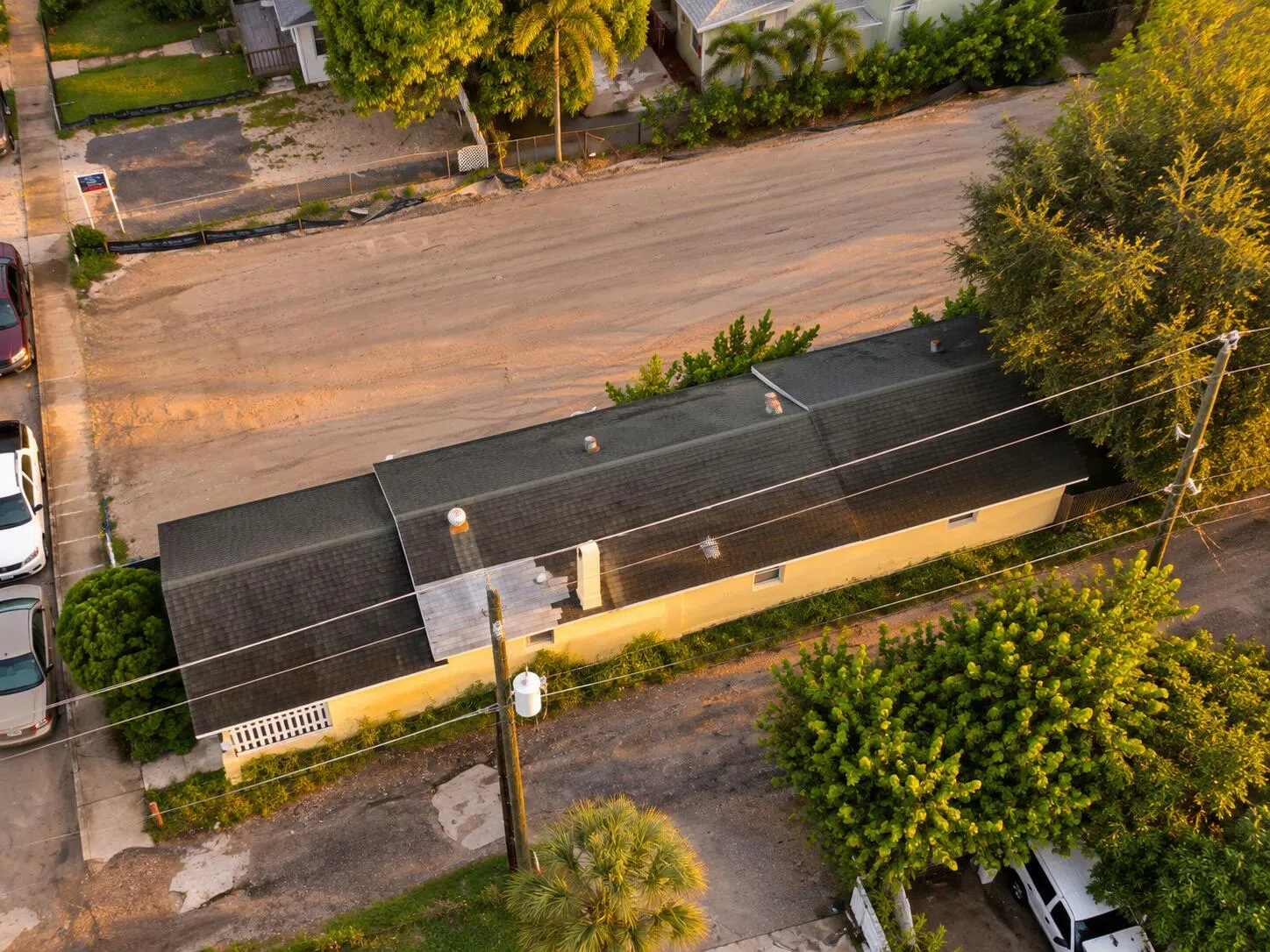 Golden-Hour Aerial View of Yellow House