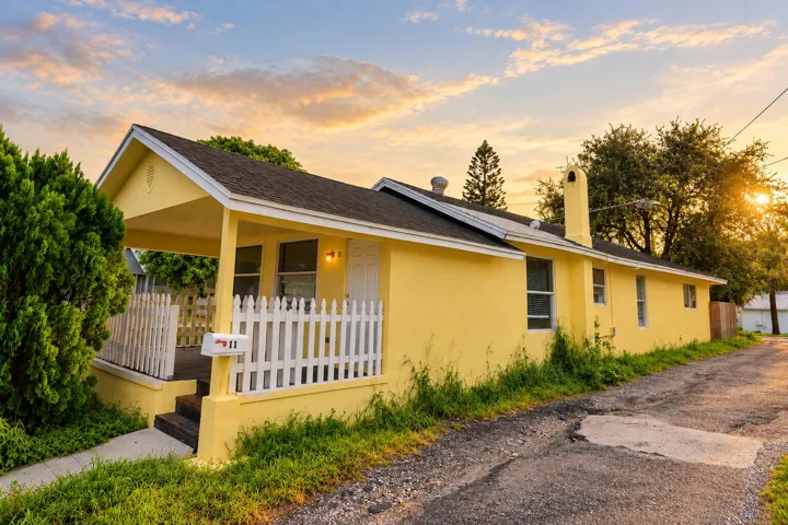 Golden-Hour Yellow House Exterior