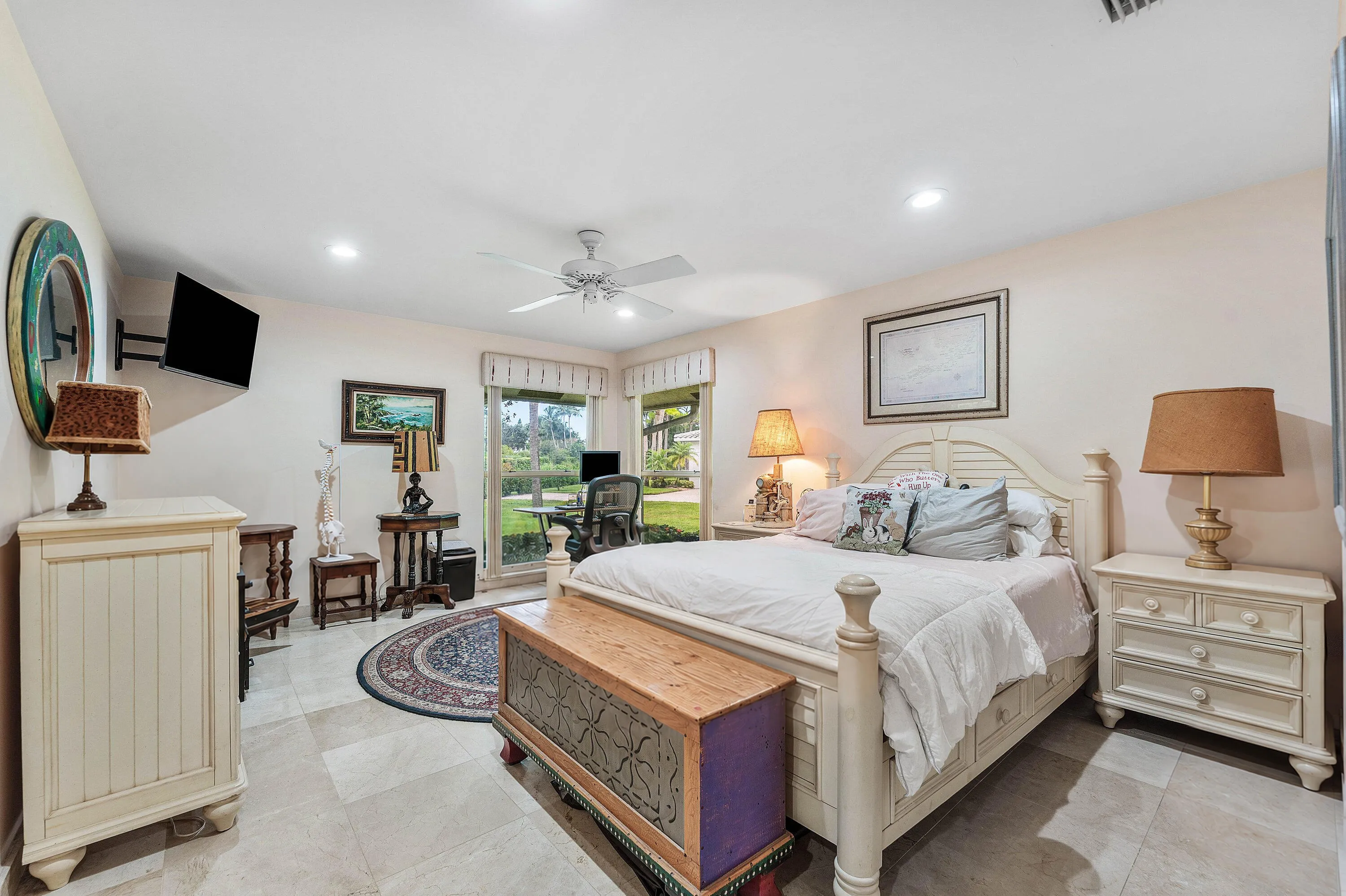 Recessed lighting, ceiling fan, tile flooring, and direct outdoor access