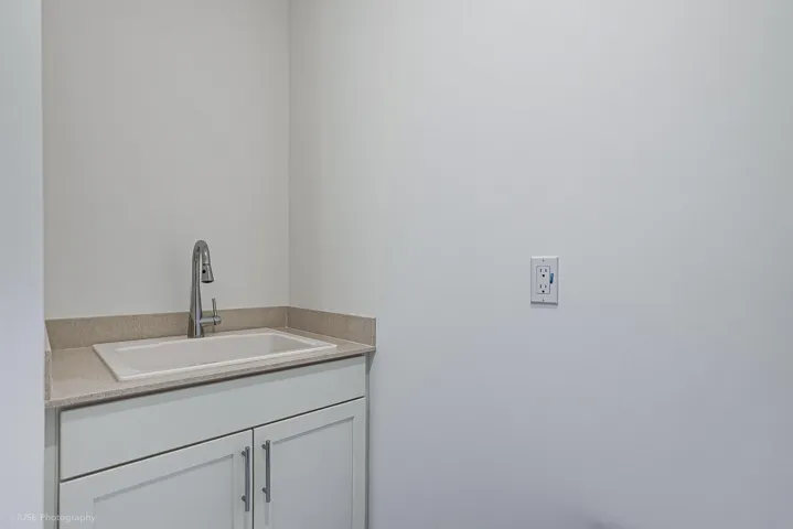 Laundry sink in laundry room