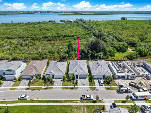 Minutes from the beach with protected land touching the rear of the property which adds to the privacy....location, location, location and NO flood insurance required