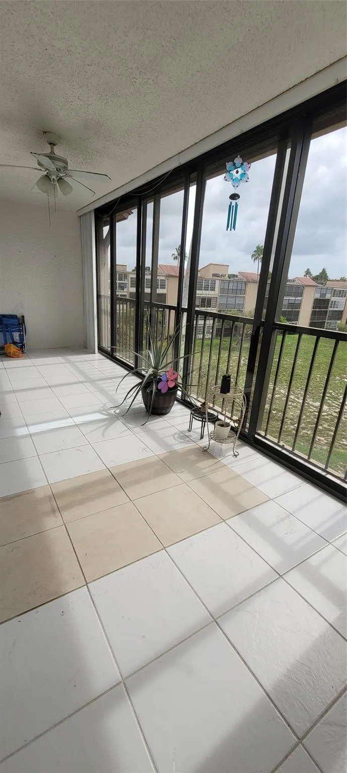 Spacious Balcony-Glass windows.