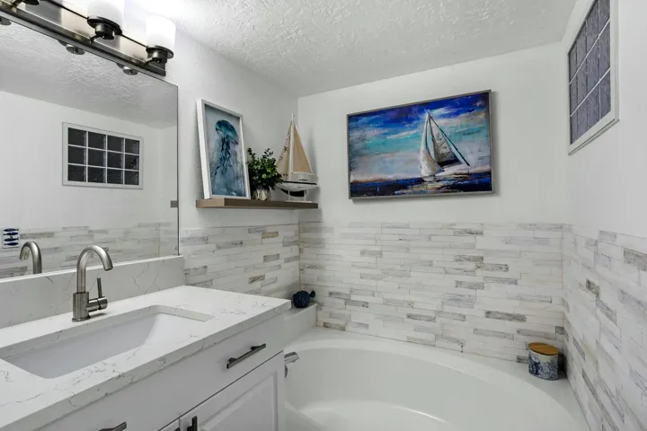Primary Bathroom includes a separate tub and shower