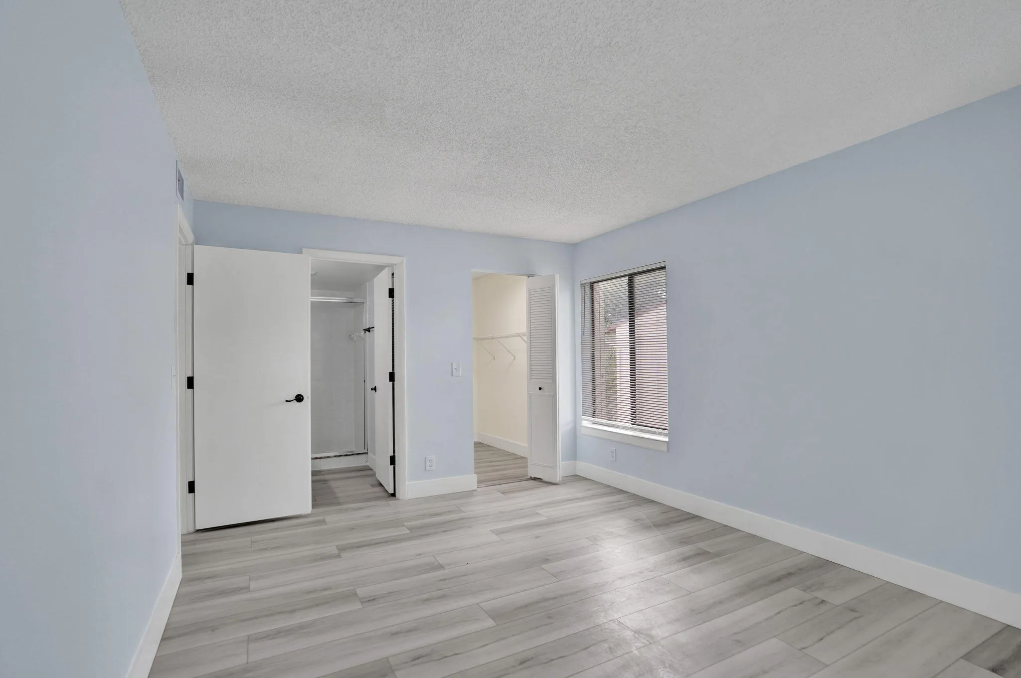 MAIN BEDROOM WITH BATH AND CLOSET