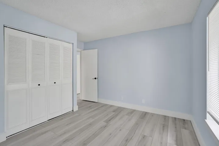 GUEST BEDROOM WITH WALL CLOSET