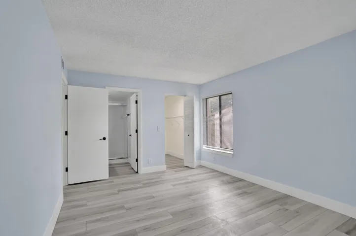 MAIN BEDROOM WITH BATH AND CLOSET