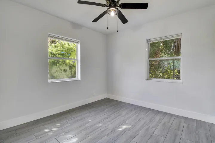 Light gray wood-look tile flooring