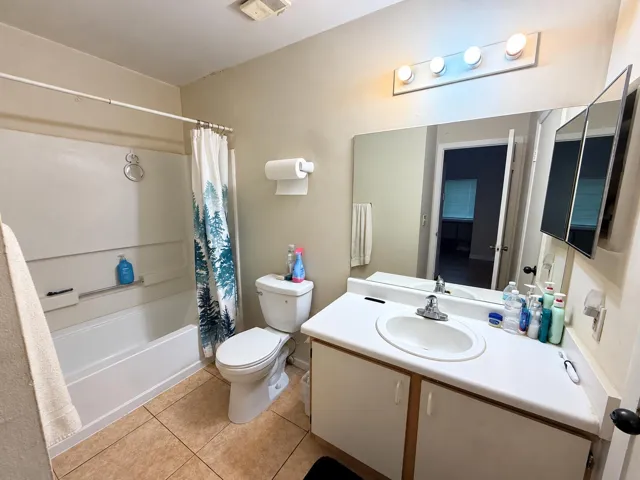 Clean Beige Bathroom with Forest Shower