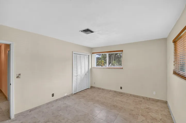 Neutral tone walls with tile flooring