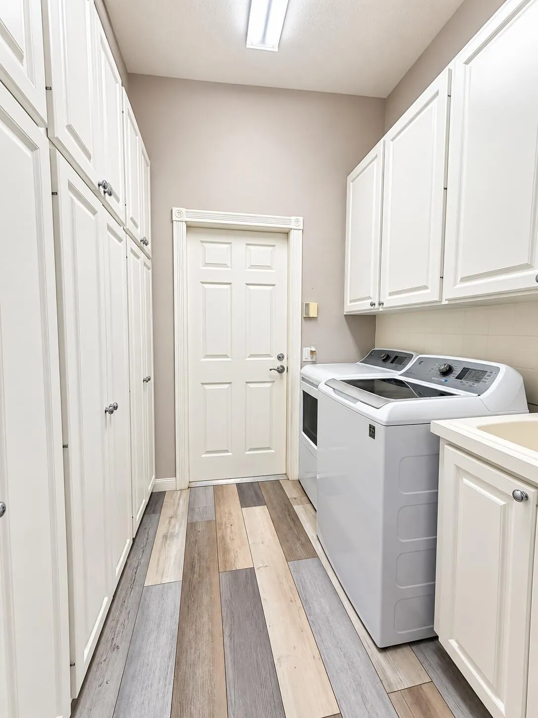 Laundry with tons of storage.