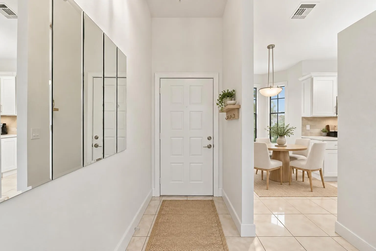 Styled entryway with oak dining nook