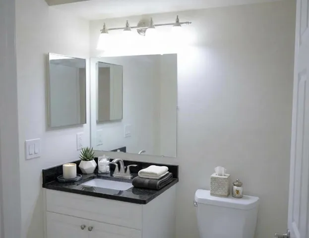 BATHROOM WITH LINEN CLOSET