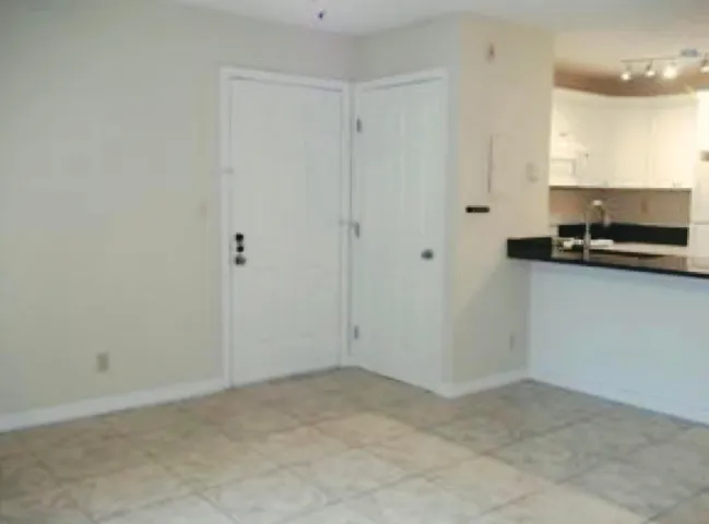 FRONT DOOR WITH CLOSET FOR STORAGE NEXT TO IT