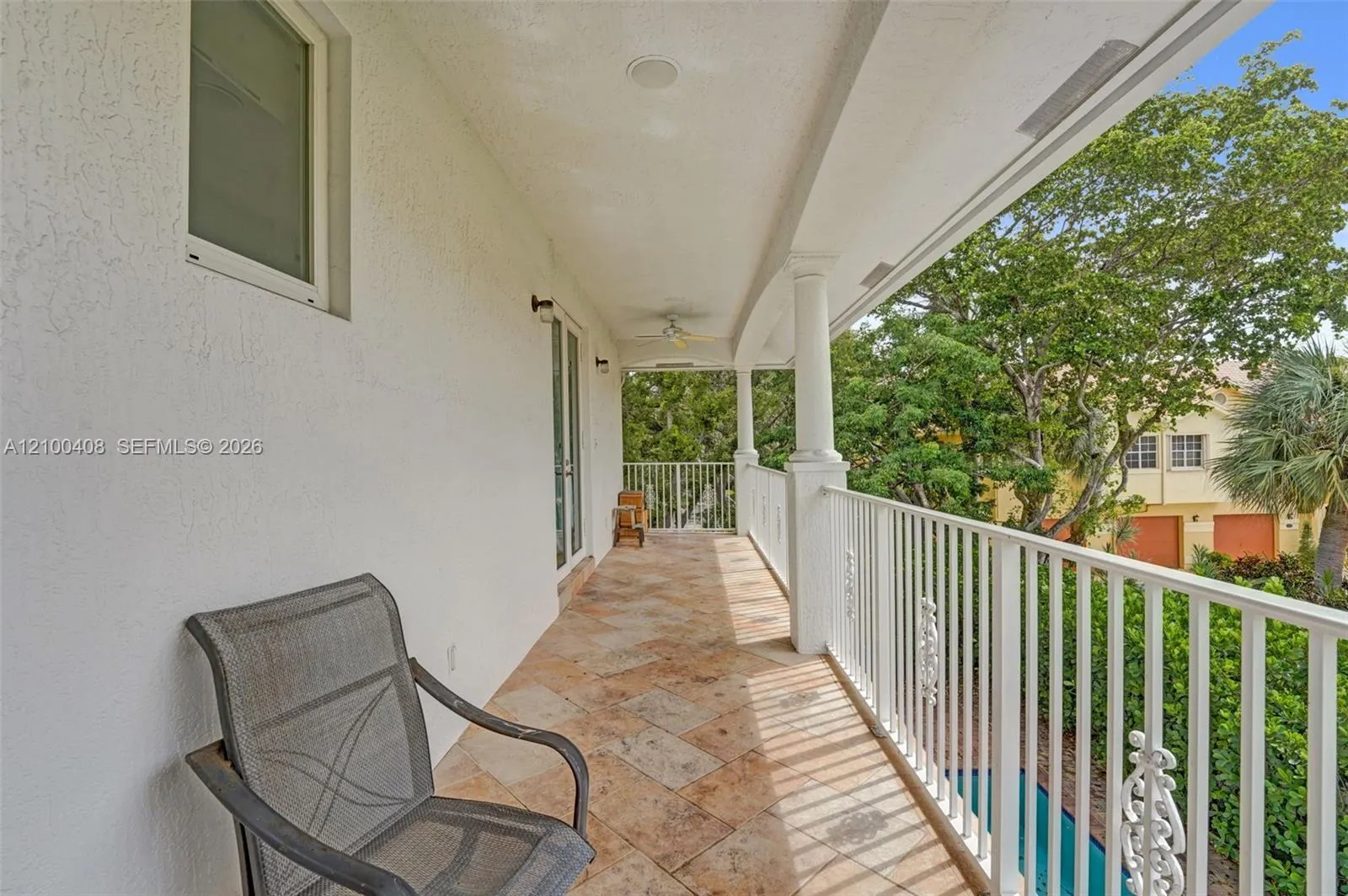 Access this expansive balcony from the primary bedroom