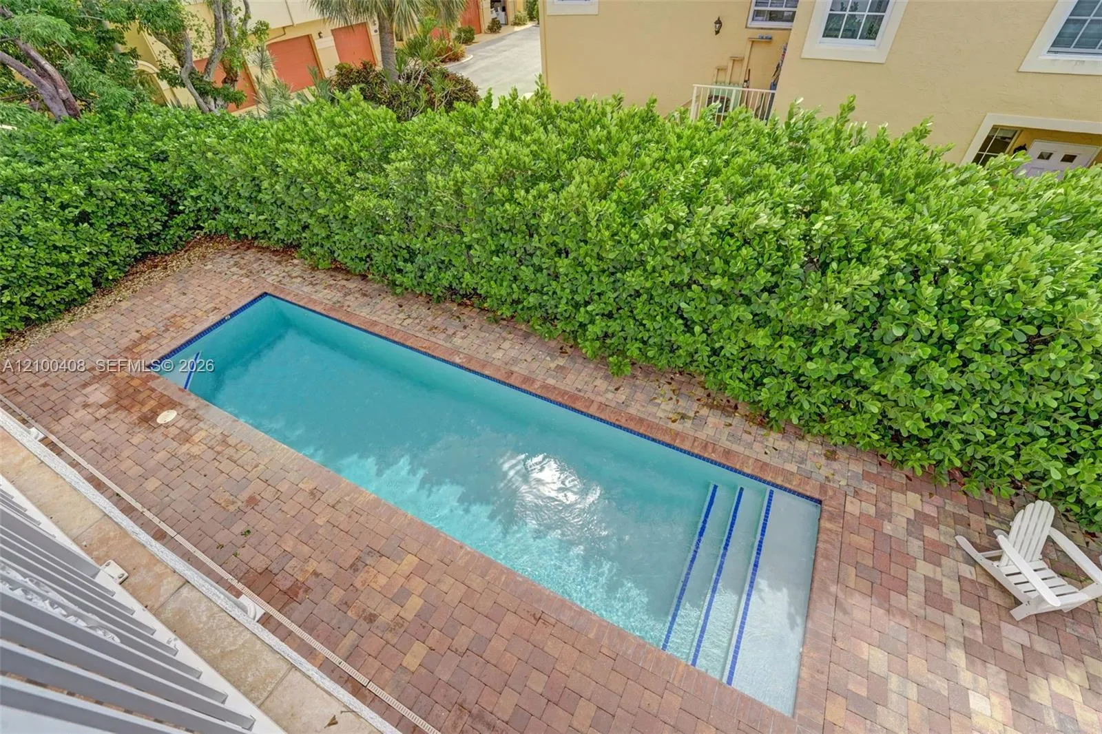 View of your lap pool from your private balcony.