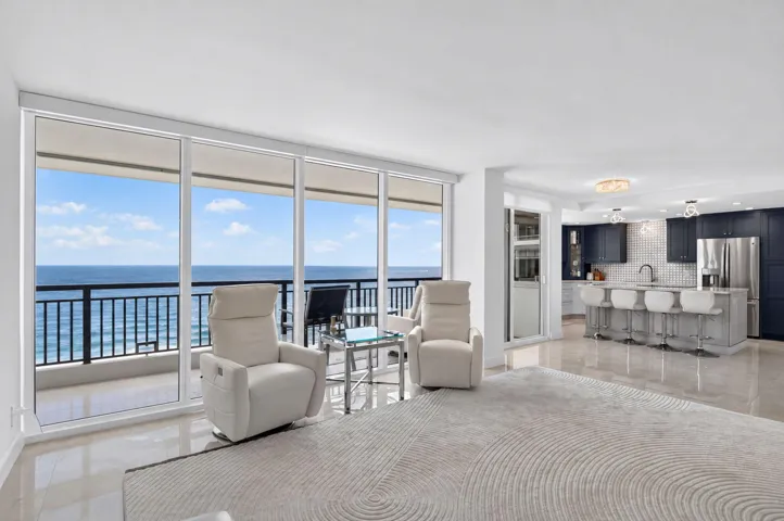 Electric blinds in living room, impact glass plus shutters on patio for extra protection