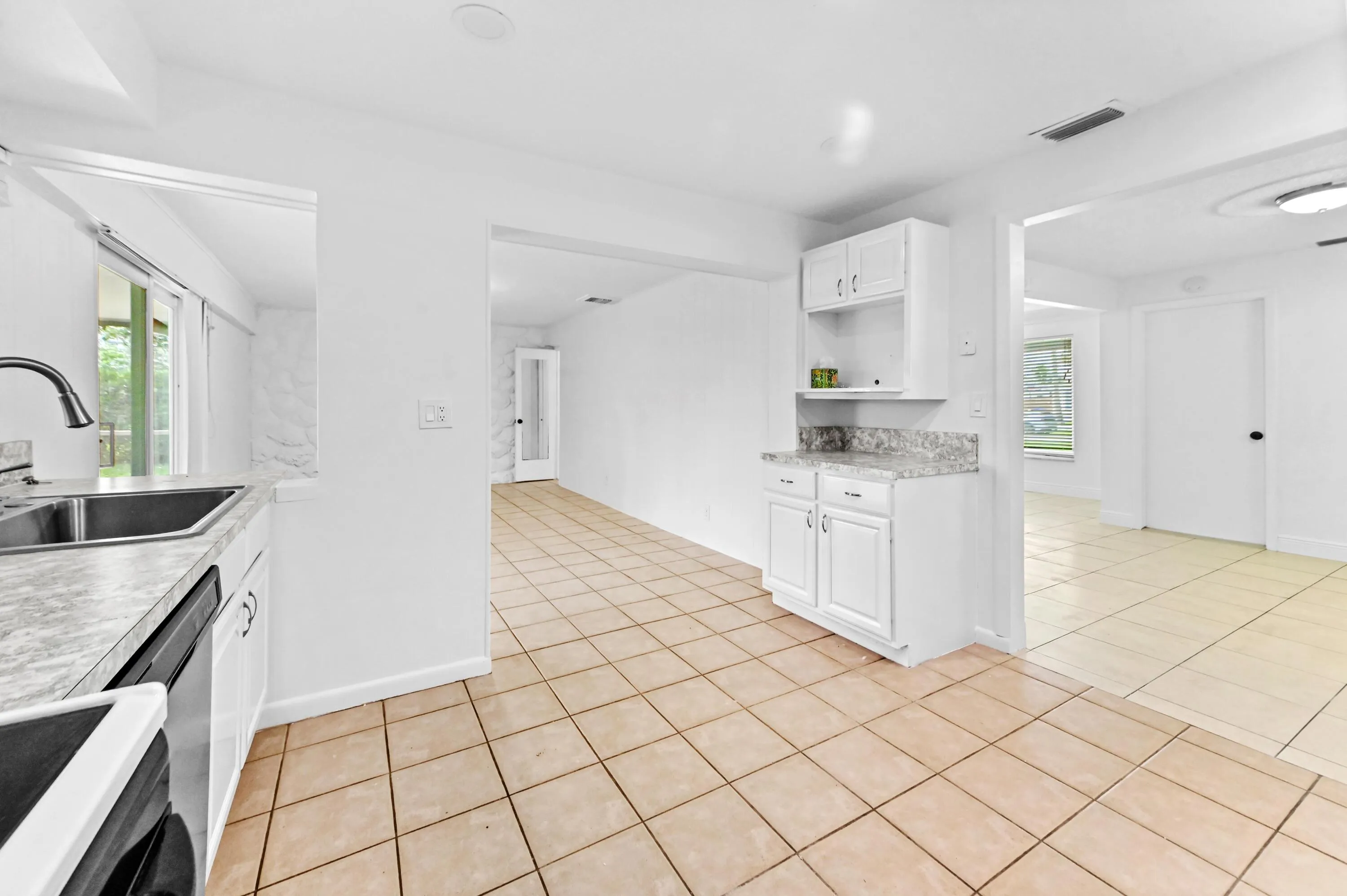 Kitchen has desk area