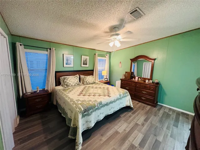 Master Bedroom easily fits KING size bed, dual nightstands, dresser and wardrobe and/or armoire