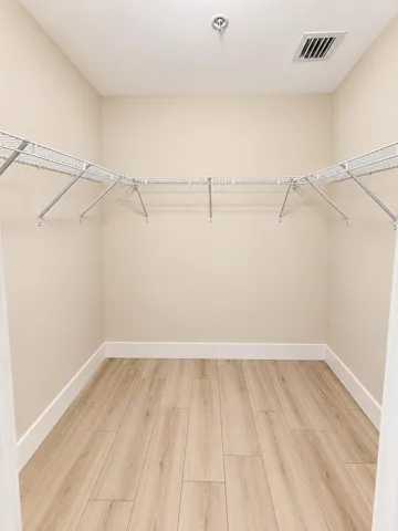 Primary Bedroom walk-in closet