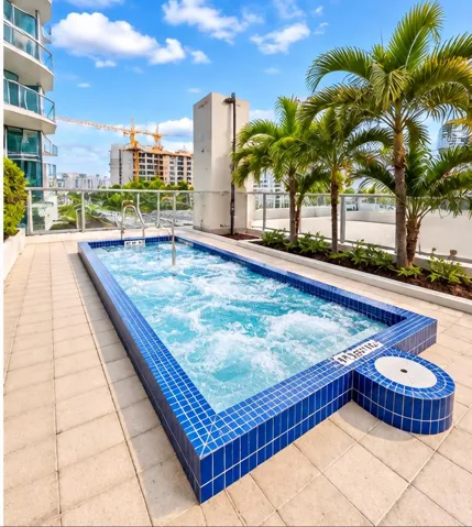 Large Jacuzzi with great city views.