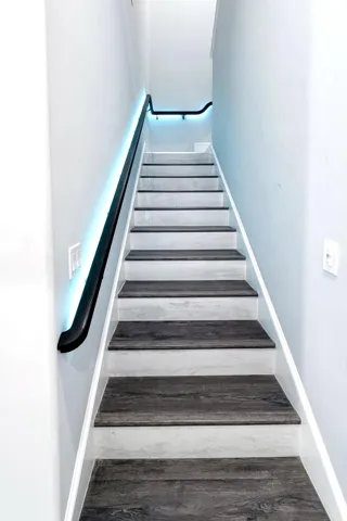 staircase with lighting