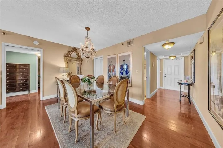 Foyer view and dining area and half bath