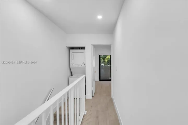 The upstairs has the Primary Bedroom & the 2nd Bedroom. Notice the washer/Dryer is upstairs close to both bedrooms. Also notice the the two bdrms are separated from each other as opposed to being side by side!