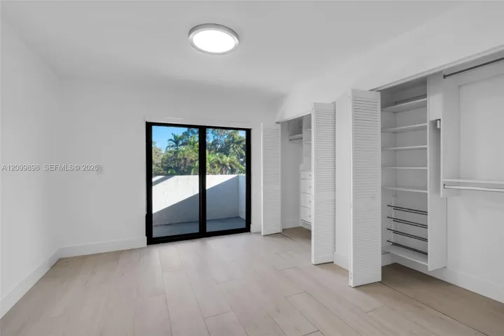 Notice right wall has 2 full closets with "built-ins" already in place!