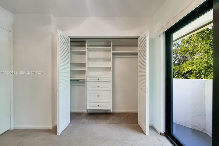The North Bedroom has nice built-in closet organizers in the closet with new brushed nickel knobs!