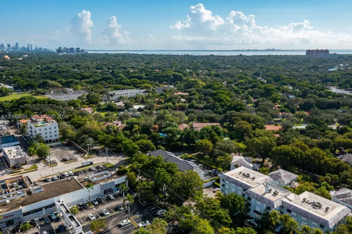Once again, looking Easterly and seeing Downtown Miami, the Brickell area and also Downtown Coconut Grove and beyond Biscayne Bay you can see the Key Biscayne Island where you have Crandon Beach & my favorite, Cape Florida State Park, where the oldest light house is situated in Miami-Dade County, both are BEACH sites that have the cleanest & nicest beaches, South of Miami Beach!!