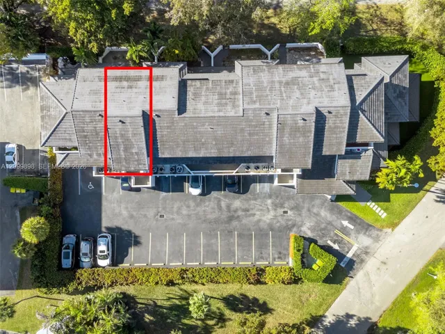 Unit 206 is outlined in the red lines and you can see the large balcony facing to the South at tree-top heighst and overlooks a quiet residential Family neighborhood.