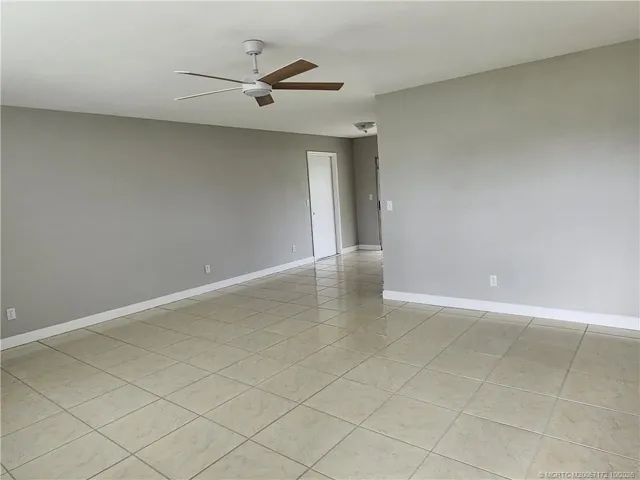 Looking from the front door to the door to garage and eating area.
