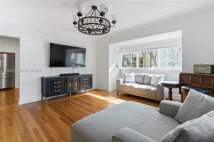 Spacious family room offering flexible space for dining and entertaining.