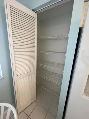 located next to the laundry utility closet.