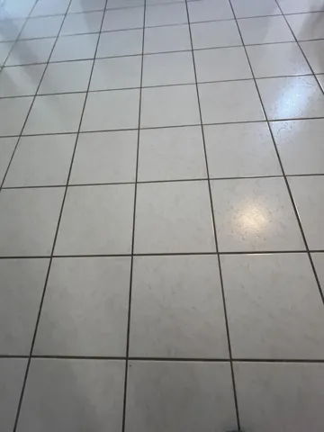 tiled throughout the unit in neutral color