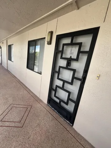 condo #305 with screened door
