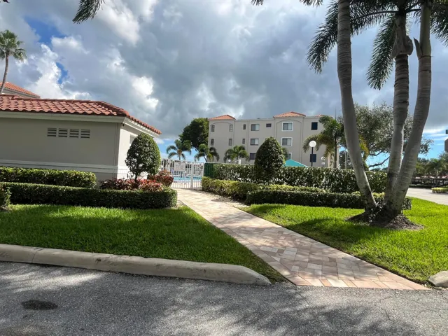 located next to the condo, the outdoor heated satellite pool entrance.