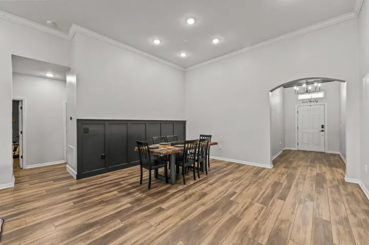 Dining room features beautiful wainscoting wall panels