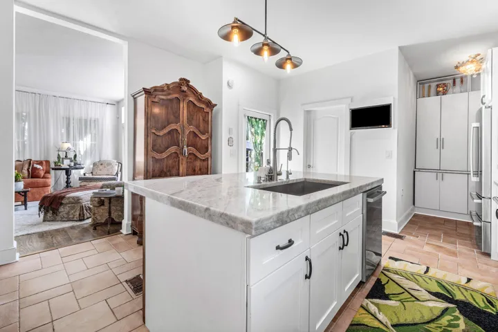 Kitchen addition, pantry, and full bath.