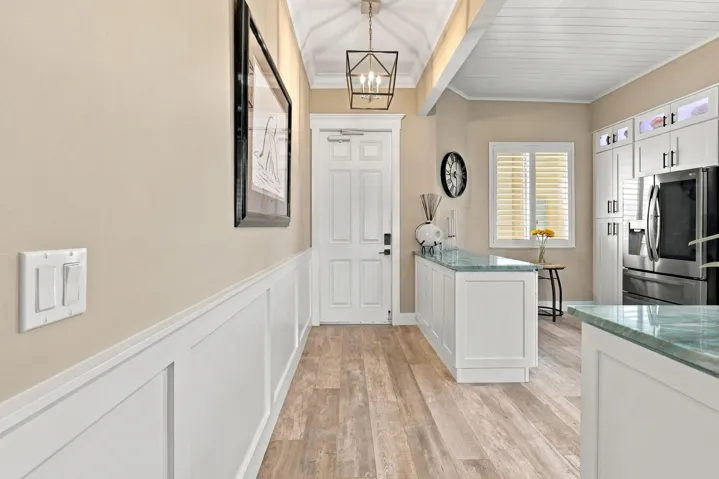 Beautiful 4’ x 8’ Wood Tone Tile with 34 Different Designs is throughout the home. Also, all press-board trim/molding has been replaced with solid wood.