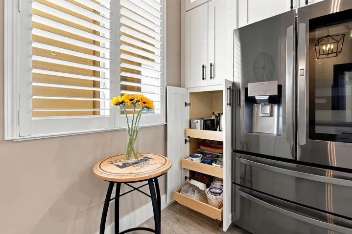 Custom Pull-out Wood Shelving in Cabinetry.