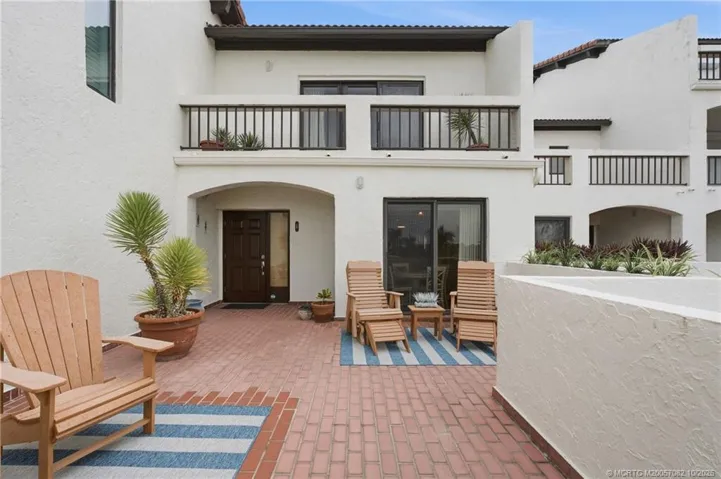 Expansive brick courtyard offers plenty of room for outdoor seating, entertaining and relaxing.