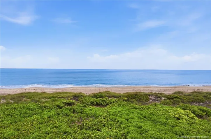 Beautiful unobstructed view across the natural dunes to the sandy beach and Atlantic Ocean.