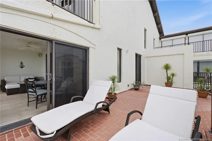 A second view highlights the exceptional outdoor space, perfect for relaxing in the Florida sunshine.