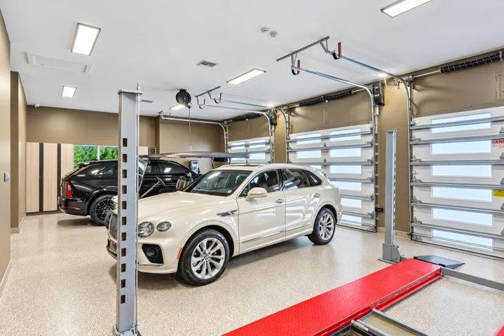 FOUR CAR GARAGE WITH LIFTS