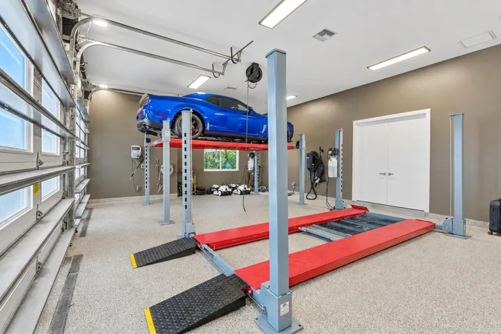 FOUR CAR GARAGE WITH LIFTS