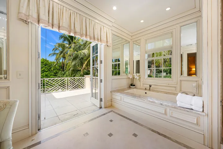 Her Bathroom with adjoining balcony to his bathroom