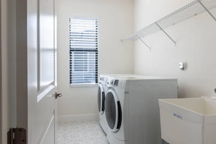 Washer,Dryer and utility sink.