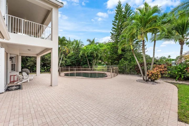 Large patio with private pool and lake views